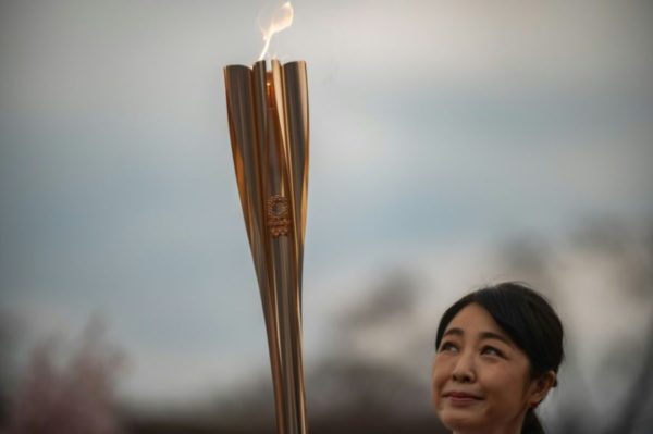 Flambeau olympique fait avec un tube 